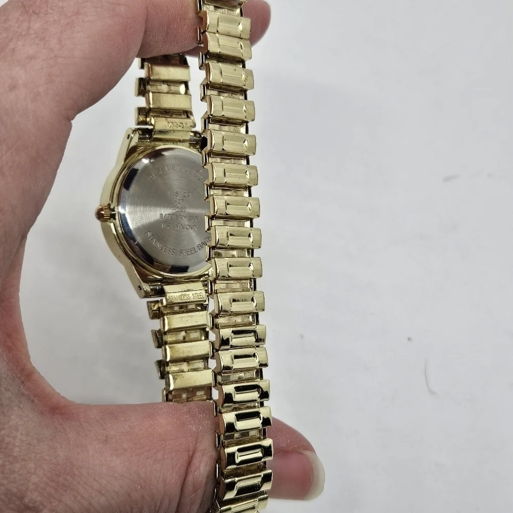 gold tone stretch watch with rhinestone case